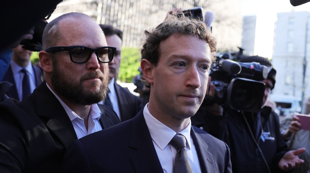 Meta CEO Mark Zuckerberg arrives for a landmark trial over whether social media platforms deliberately addict and harm children, Wednesday, Feb. 18, 2026, in Los Angeles. (AP Photo/Ryan Sun)