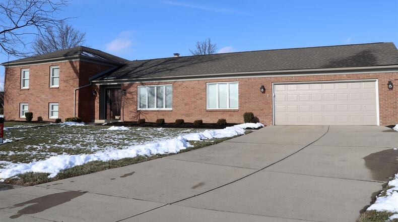 The tri-level home has a possible fourth bedroom on the lower level along with a recreation room. In the back, a patio and basketball court are surrounded by tailored landscaping.
CONTRIBUTED PHOTOS BY KATHY TYLER