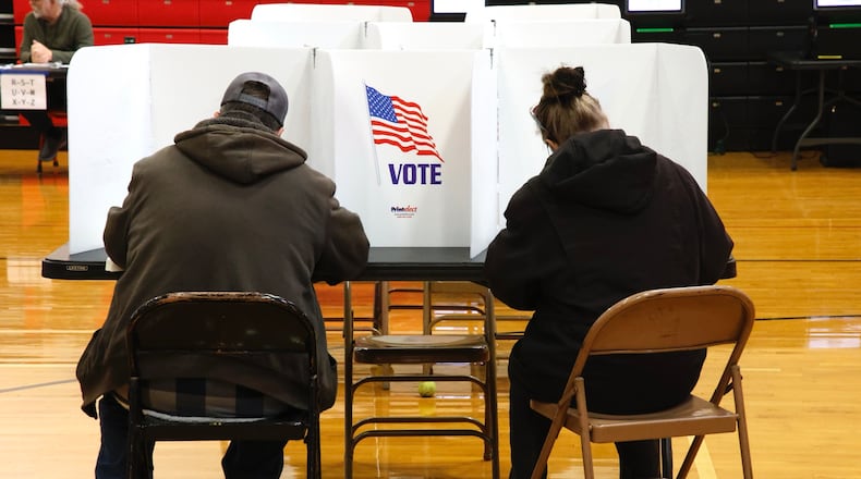 Clark County voters cast their vote Tuesday, March 19, 2024 at Tecumseh High School. BILL LACKEY/STAFF