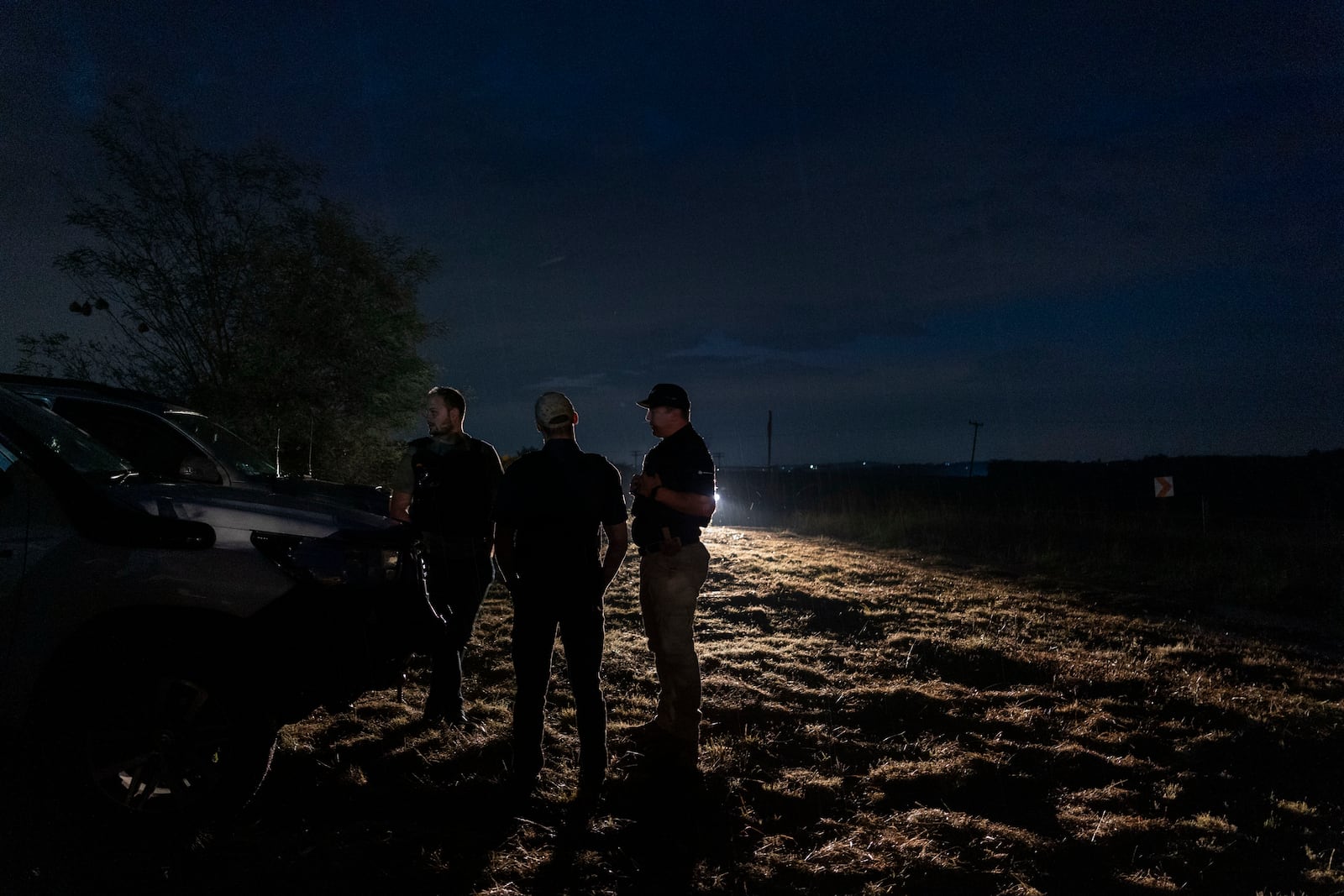 Members of Afriforum, a neighborhood and farm security group, assemble before a patrol in Bashewa area in the east of Pretoria, South Africa, Thursday, March 29, 2025. (AP Photo/Alet Pretorius)