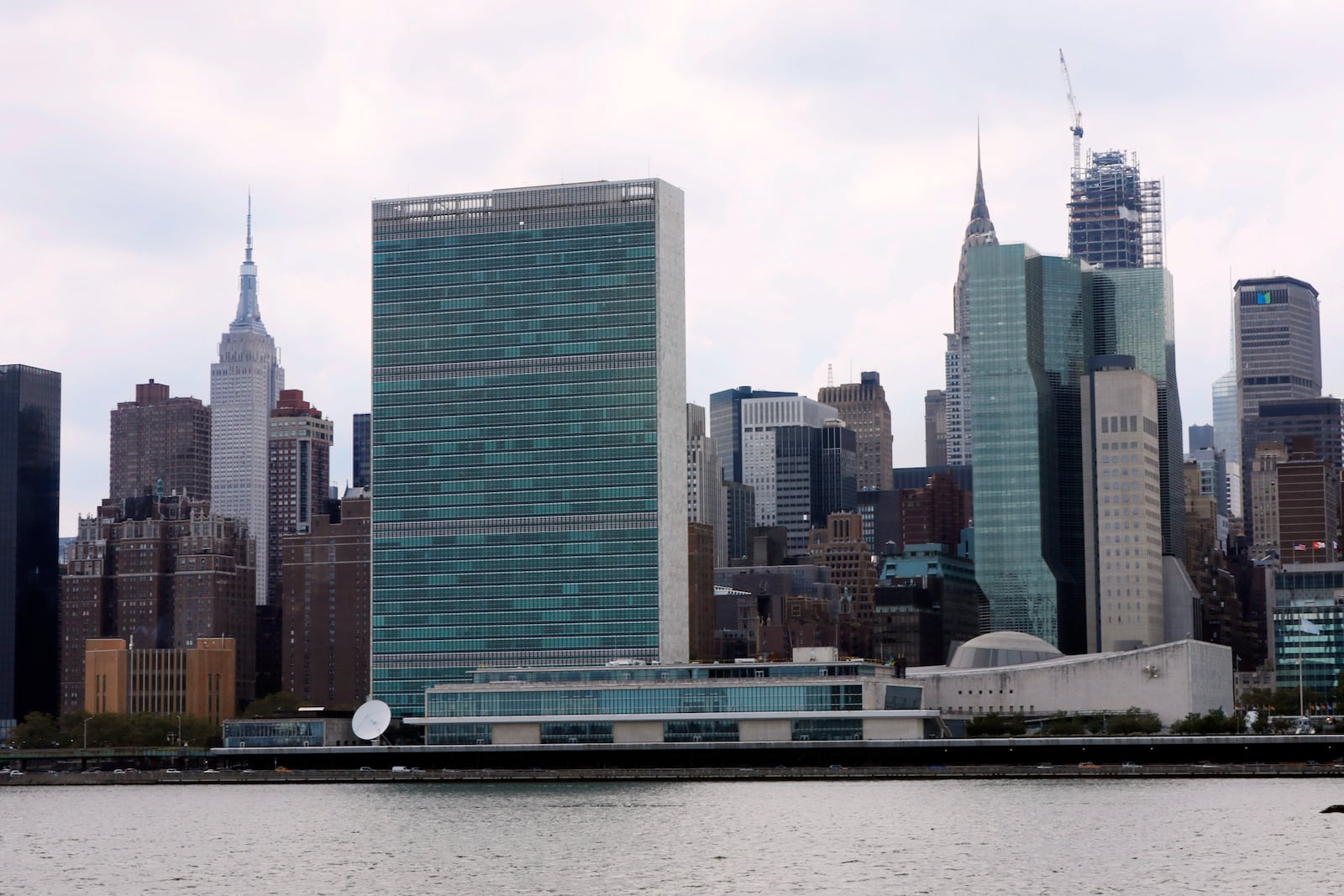 The United Nations complex and Empire State Building, left, as seen from the Long Island City neighborhood of the Queens borough of New York, Aug. 22, 2019. (AP Photo/Richard Drew, File)