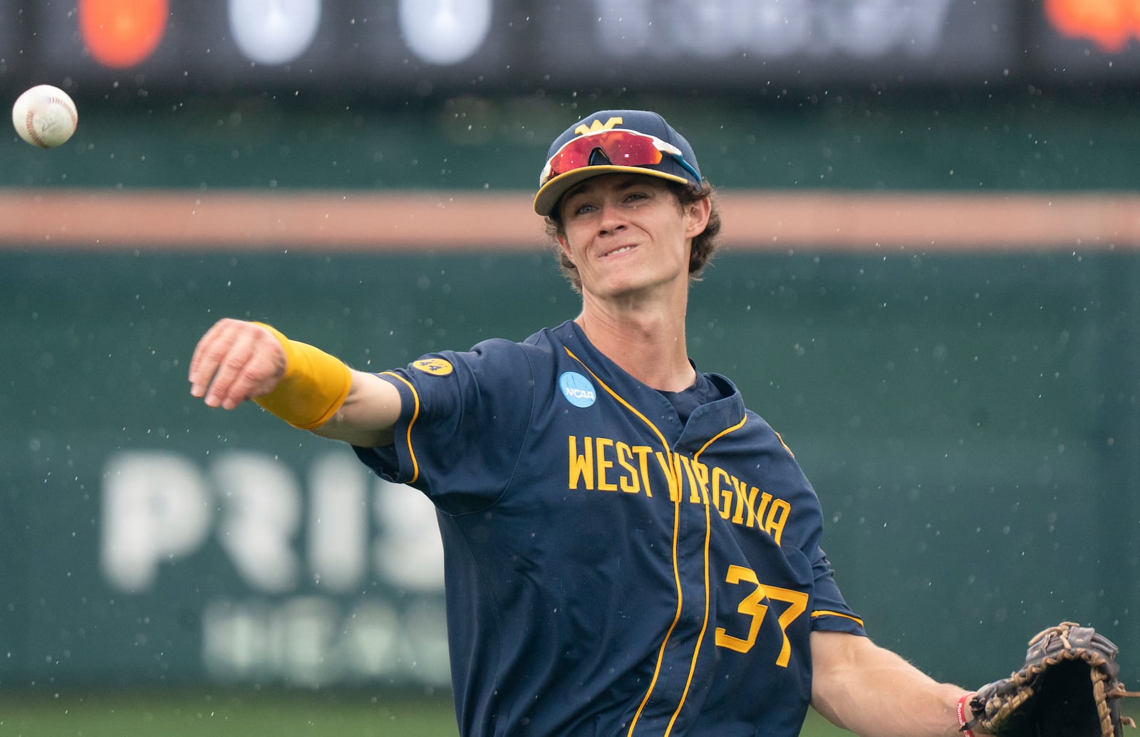 FILE - West Virginia infielder Ben Lumsden warms up before an NCAA regional college baseball game against Kentucky, May 30, 2025, in Clemson, S.C. (AP Photo/Sean Rayford, File)