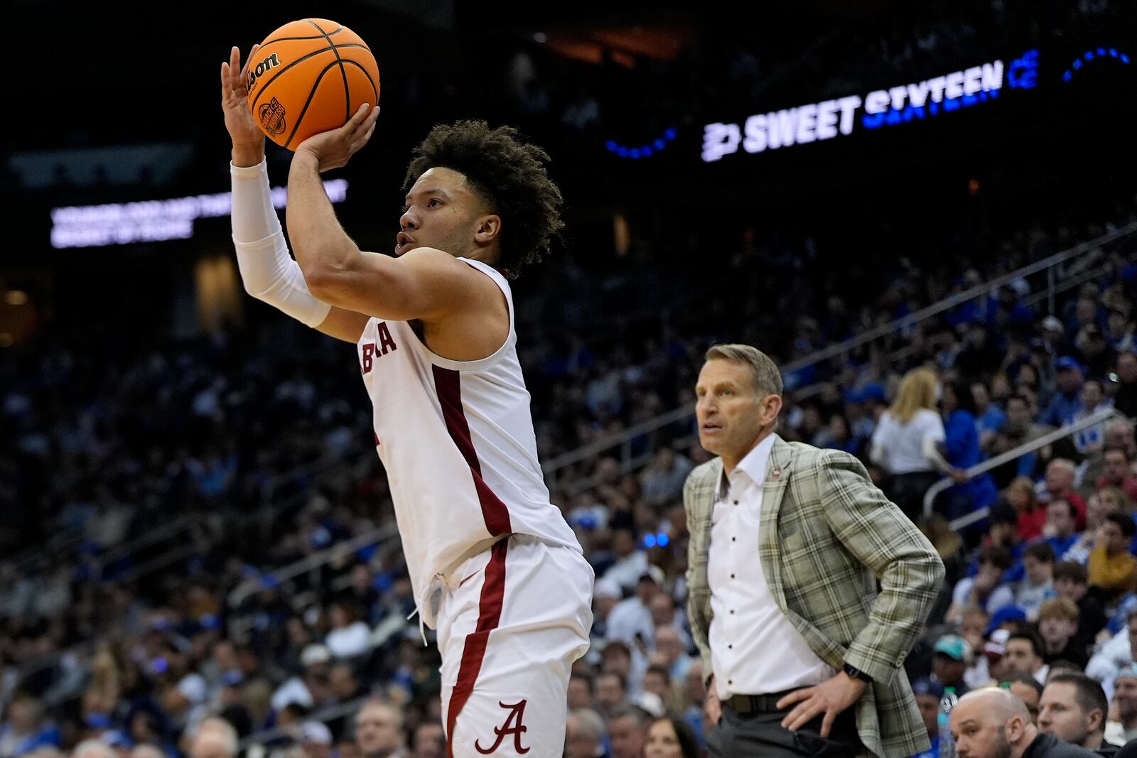 Alabama guard Mark Sears (1) puts up a shot against Brigham Young during the second half of a Sweet 16 round NCAA college basketball tournament game, Thursday, March 27, 2025, in Newark, N.J. (AP Photo/Julia Demaree Nikhinson)