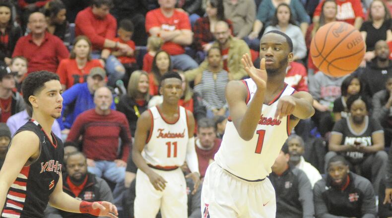 Trotwood’s Amari Davis scored 18 points. Trotwood-Madison defeated Cin. Hughes 84-74 to win a boys high school basketball D-II regional championship at Trent Arena on Sat., March 17, 2018. MARC PENDLETON / STAFF