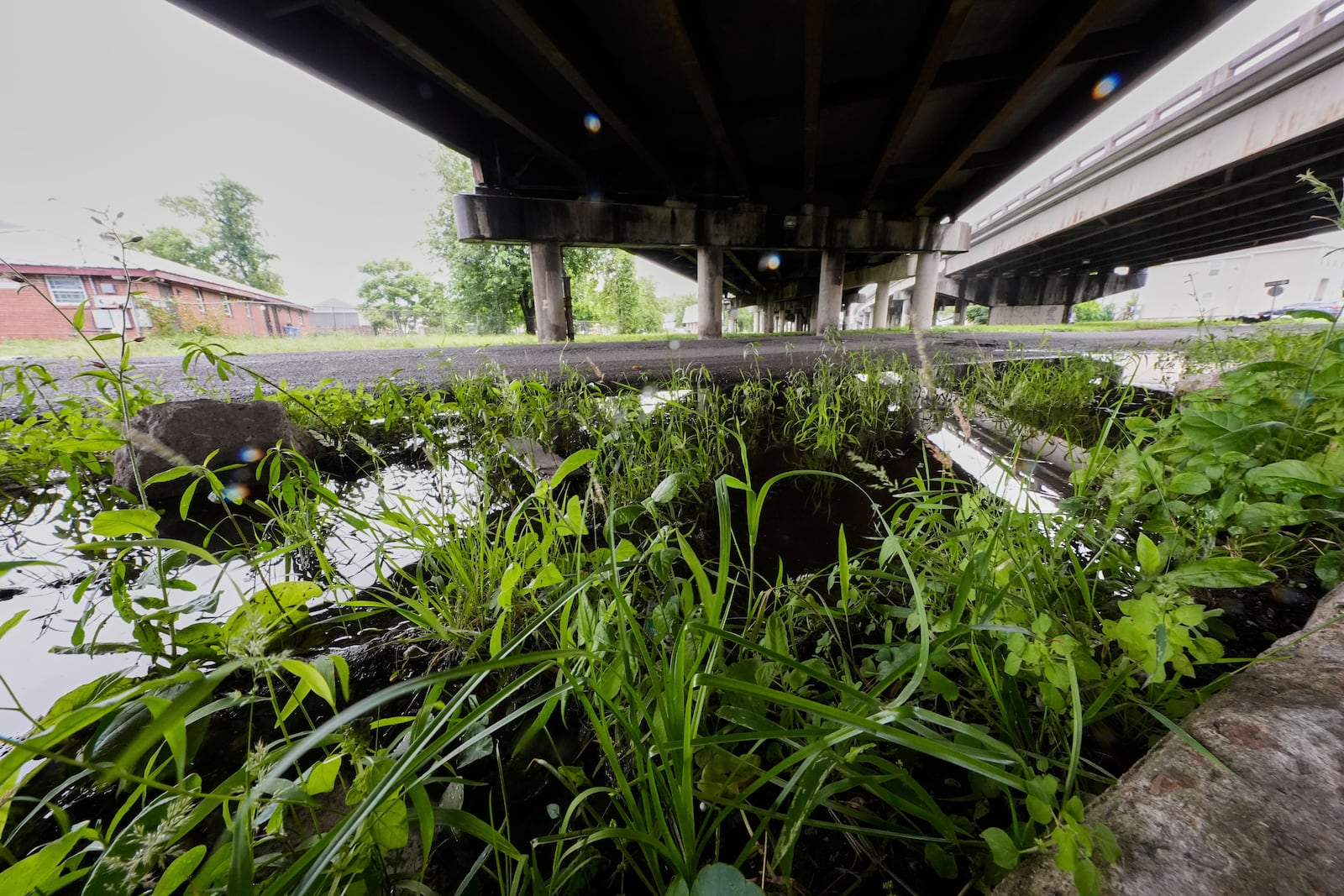 The expressway overpass that replaced of the home of the grandparents of Pope Leo XIV, is seen at the site of the former home, in the 7th Ward of New Orleans Friday, May 9, 2025. (AP Photo/Gerald Herbert)