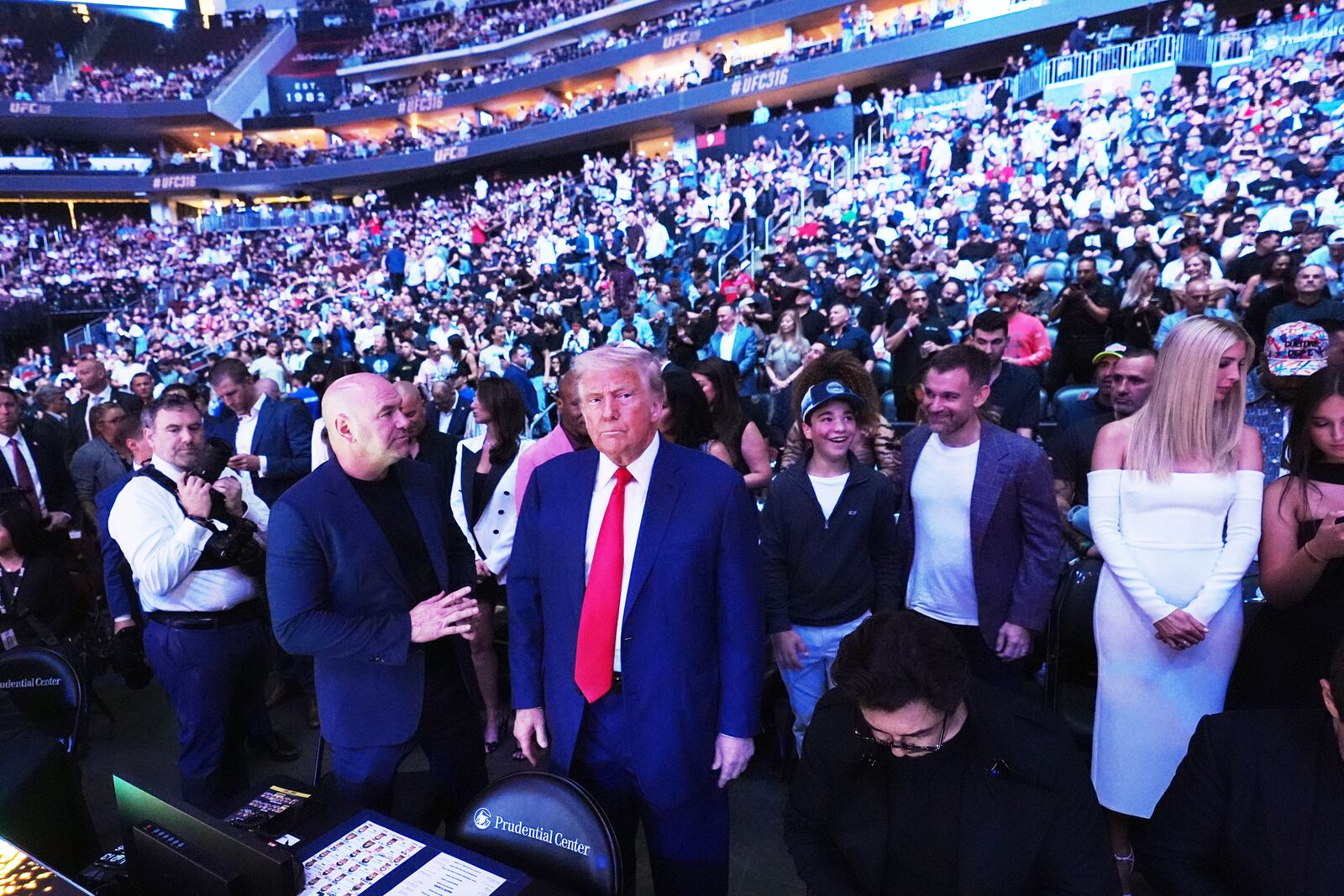 President Donald Trump attends the UFC-316 mixed martial arts event, at the Prudential Center, Saturday, June 7, 2025, in Newark, N.J., as UFC's Dana White, looks on. (AP Photo/Frank Franklin II)