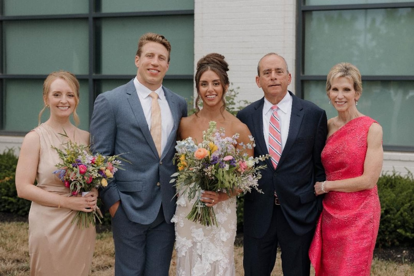 Cheryl McHenry with her family: (left to right) daughter Christina, son-in-law Phil, daughter Maria, and husband Bob at Maria's wedding in 2024. CONTRIBUTED