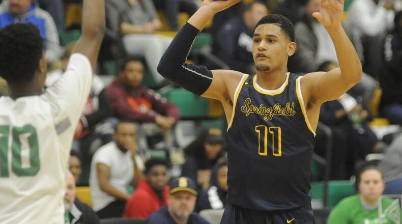 Springfield’s Leonard Taylor (with ball). Springfield defeated host Northmont 71-49 in a boys high school basketball game on Friday, Dec. 22, 2017. MARC PENDLETON / STAFF