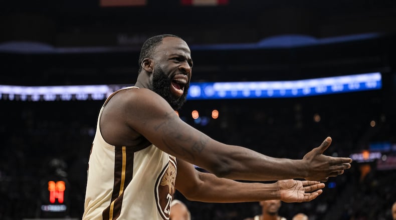 Golden State Warriors forward Draymond Green yells at the referee during the first half of an NBA basketball game against the Orlando Magic, Monday, Dec. 22, 2025, in San Francisco (AP Photo/Justine Willard)