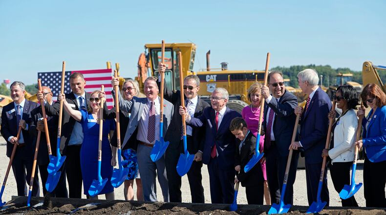 Alongside Intel CEO Pat Gelsinger, Gov. Mike DeWine and a host of business leaders, Intel broke ground Friday, Sept. 9, 2022, on a $20 billion microchip manufacturing project in New Albany, Ohio, (Adam Cairns/The Columbus Dispatch via AP)