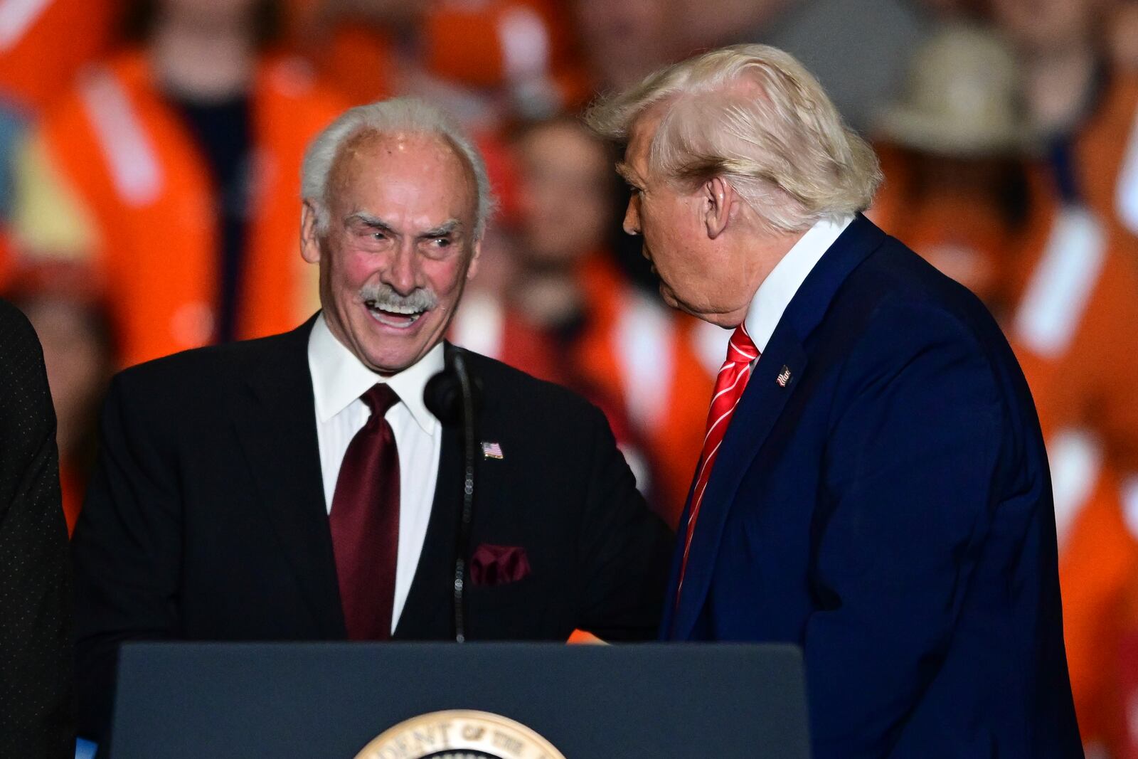 Former Pittsburgh Steelers Rocky Bleier talks with President Donald Trump at the U.S. Steel Mon Valley Works-Irvin plant, Friday, May 30, 2025, in West Mifflin, Pa. (AP Photo/David Dermer)