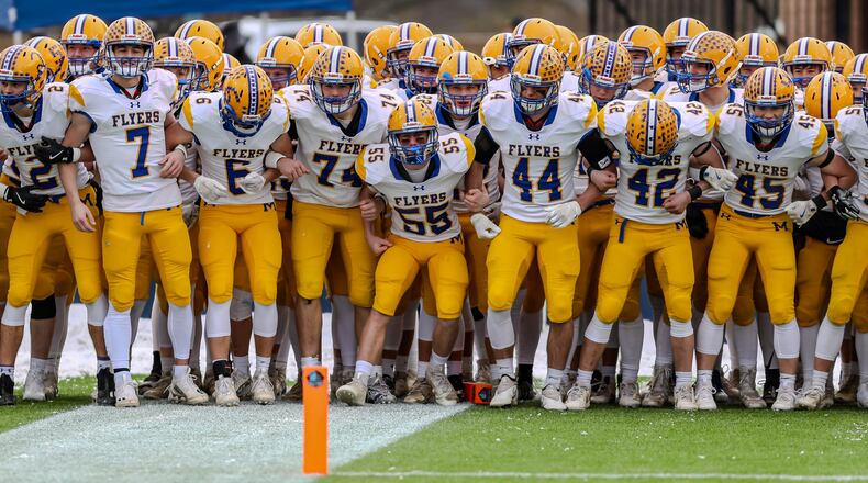 Marion Local routed Hillsdale 74-0 on Friday to win its fourth straight Division VII state football championship at Tom Benson Hall of Fame Stadium in Canton. It was the 64th consecutive win for the Flyers. Michael Cooper/CONTRIBUTED