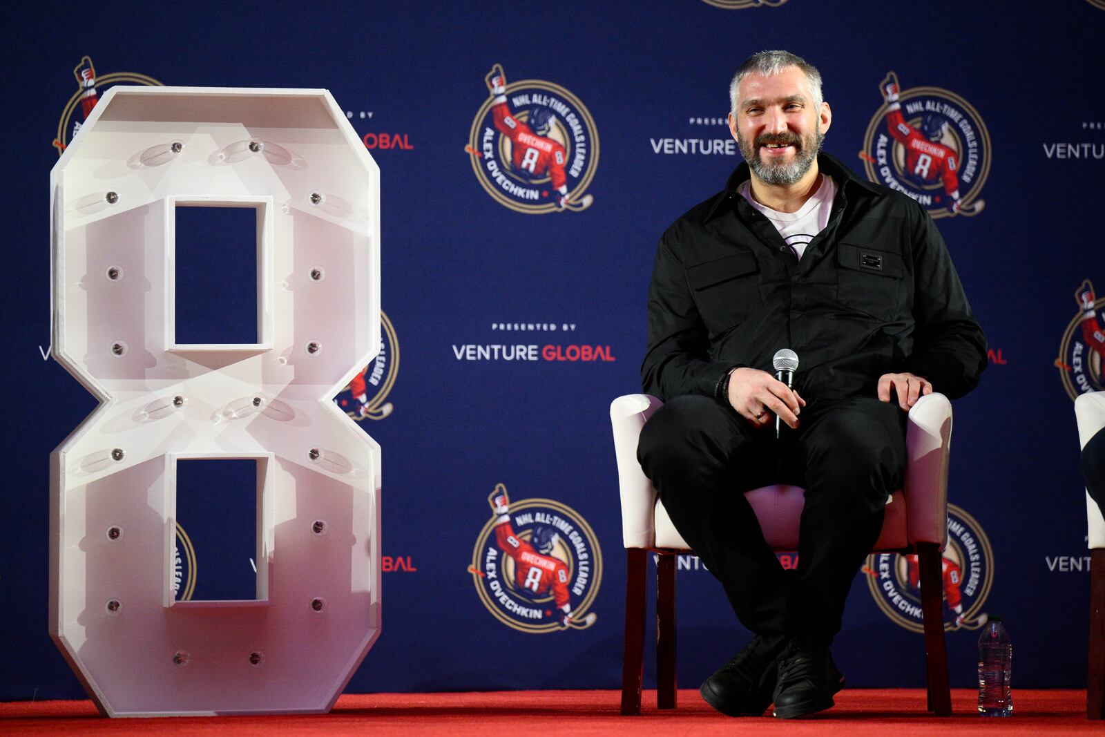Washington Capitals left wing Alex Ovechkin takes part in the GR8 city celebration to honor him for scoring 895 NHL career goals, Friday, April 11, 2025, in Washington. (AP Photo/Nick Wass)