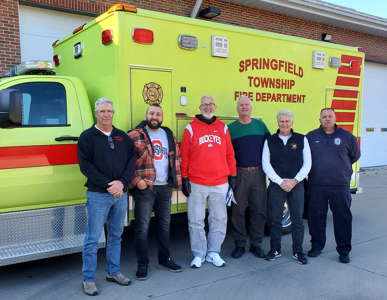 Springfield Township proudly displays a new locally built Navistar medic unit. Pictured are, from left:  V.P. John Roeder, Township Deputy Jake Shaw, Trustee Jim Scoby, Pres. Tim Foley, Fiscal Officer Mark Smith and Fire Chief Dave Nangle. CONTRIBUTED