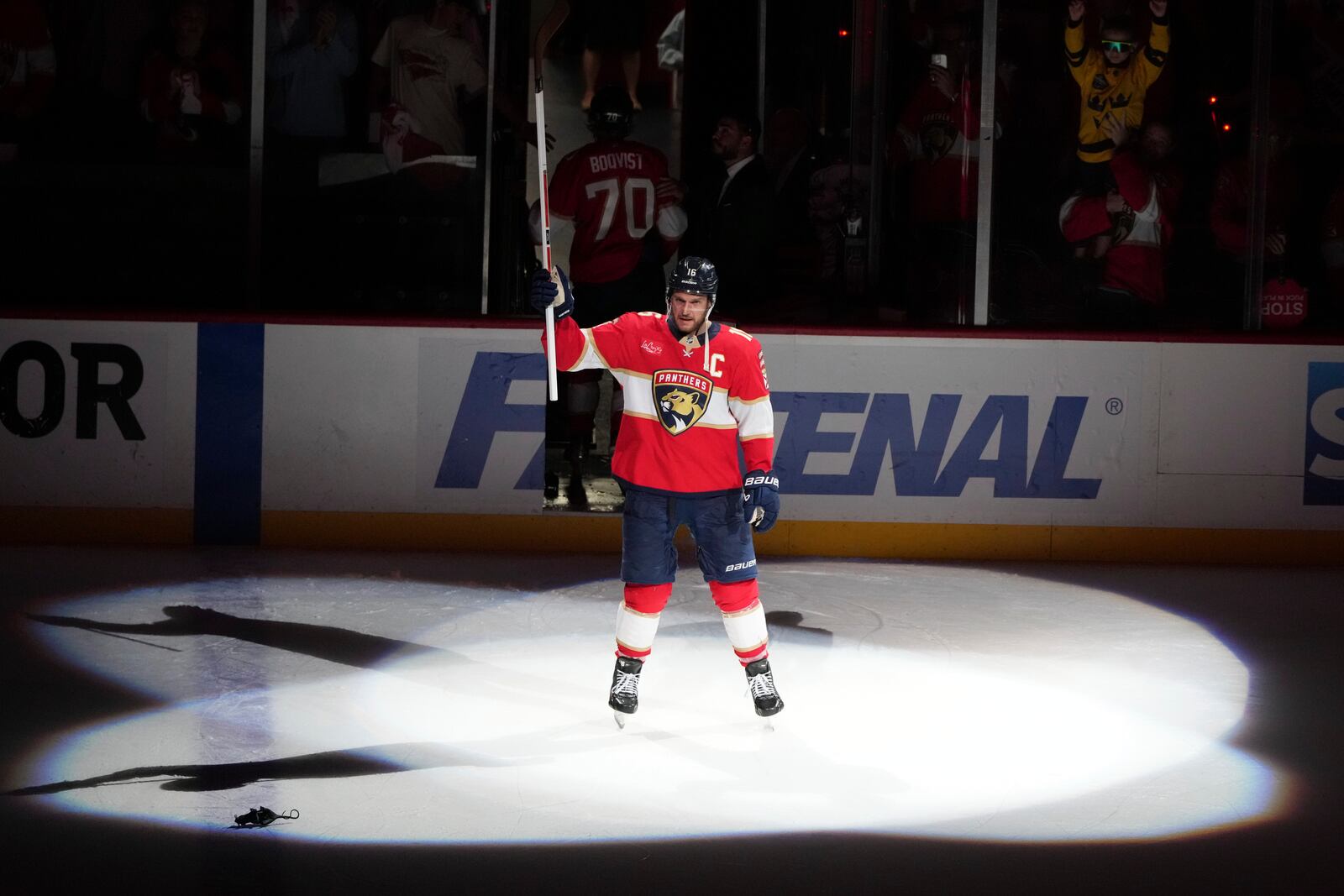 Florida Panthers center Aleksander Barkov acknowledges the crowd while being named the second player of the game after the Panthers defeated the Carolina Hurricanes in Game 3 of the NHL hockey Stanley Cup Eastern Conference finals Saturday, May 24, 2025, in Sunrise, Fla. (AP Photo/Lynne Sladky)