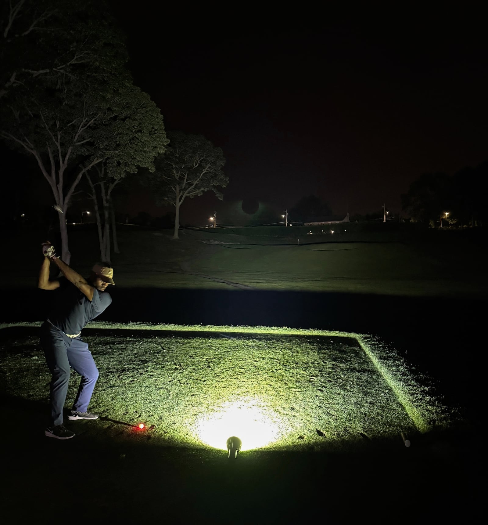 Kelechi Ezihie plays golf at the Huntington Crescent Club in Huntington, N.Y., where he played for 35 straight hours, between Sunday, June 8, 2025 to Tuesday, June 10, 2025, and is seeking validation of the Guinness World Record. (Mac McCoy via AP)