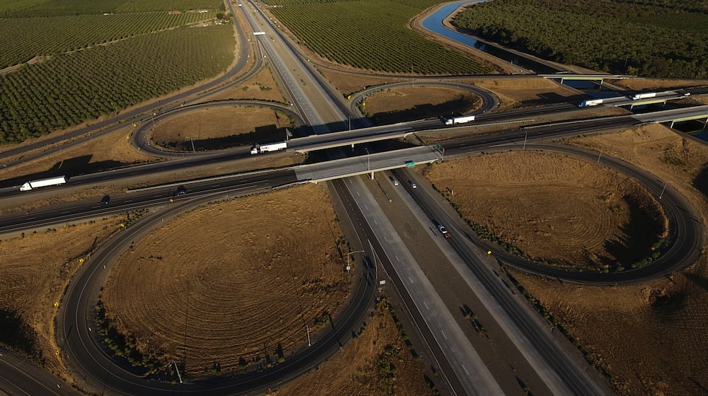 FILE - Freight trucks travel northbound on Interstate 5 Highway, Sept. 3, 2025, in Tracy, Calif. (AP Photo/Godofredo A. Vásquez, File)