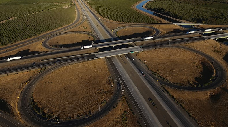 FILE - Freight trucks travel northbound on Interstate 5 Highway, Sept. 3, 2025, in Tracy, Calif. (AP Photo/Godofredo A. Vásquez, File)