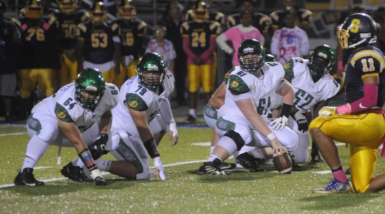 Northmont offensive linemen Chane Prysock (left), David Weherley, Logan Kincer and Jalen Hinton. Northmont defeated host Springfield 22-10 in a Week 7 GWOC crossover game on Friday, Oct. 6, 2017. MARC PENDLETON / STAFF