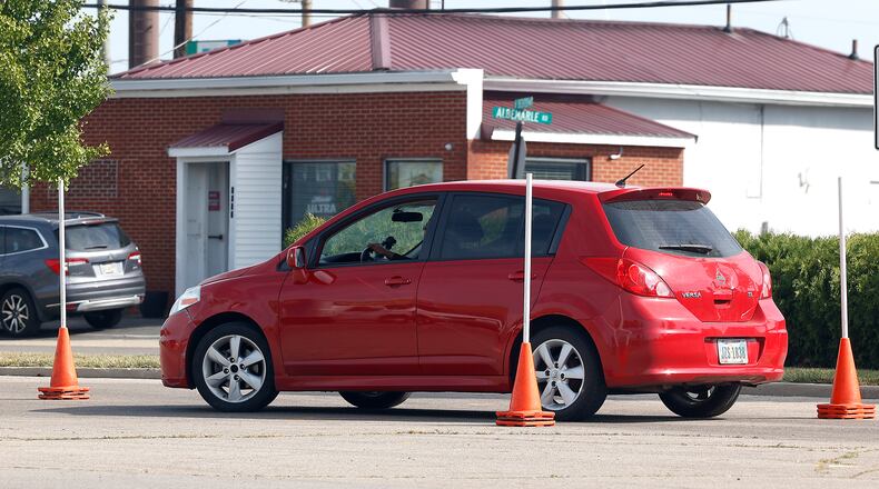 A driver goes through the maneuverability test in the parking lot of the Park Shopping Center Thursday, Sept. 21, 2023. BILL LACKEY/STAFF