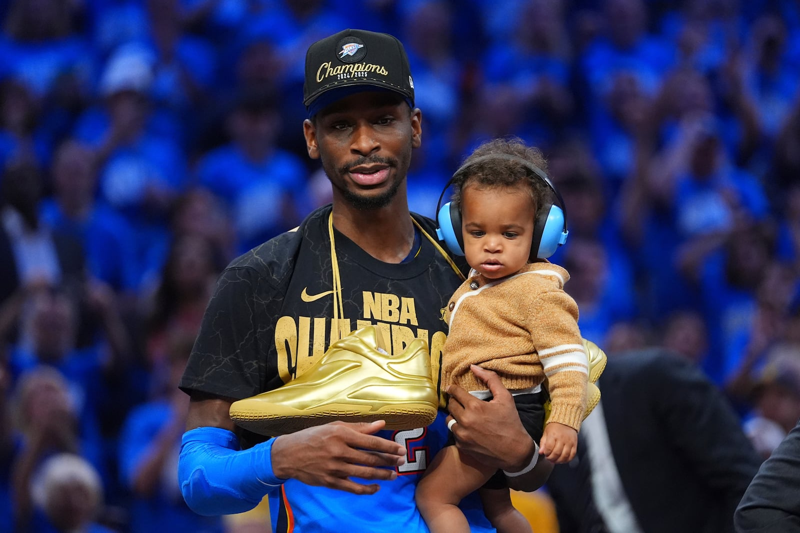 Oklahoma City Thunder guard Shai Gilgeous-Alexander celebrates after they won the NBA basketball championship with a Game 7 victory against the Indiana Pacers Sunday, June 22, 2025, in Oklahoma City. (AP Photo/Julio Cortez)
