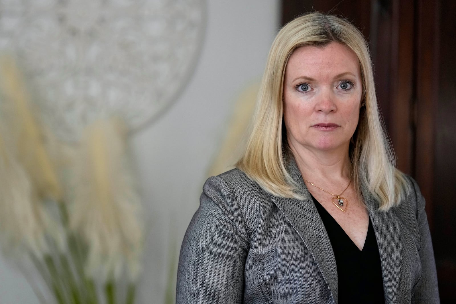 Stacey Wales, sister of the late Christopher Pelkey, is shown at her mother's home, Wednesday, May 7, 2025, in Chandler, Ariz. (AP Photo/Matt York)