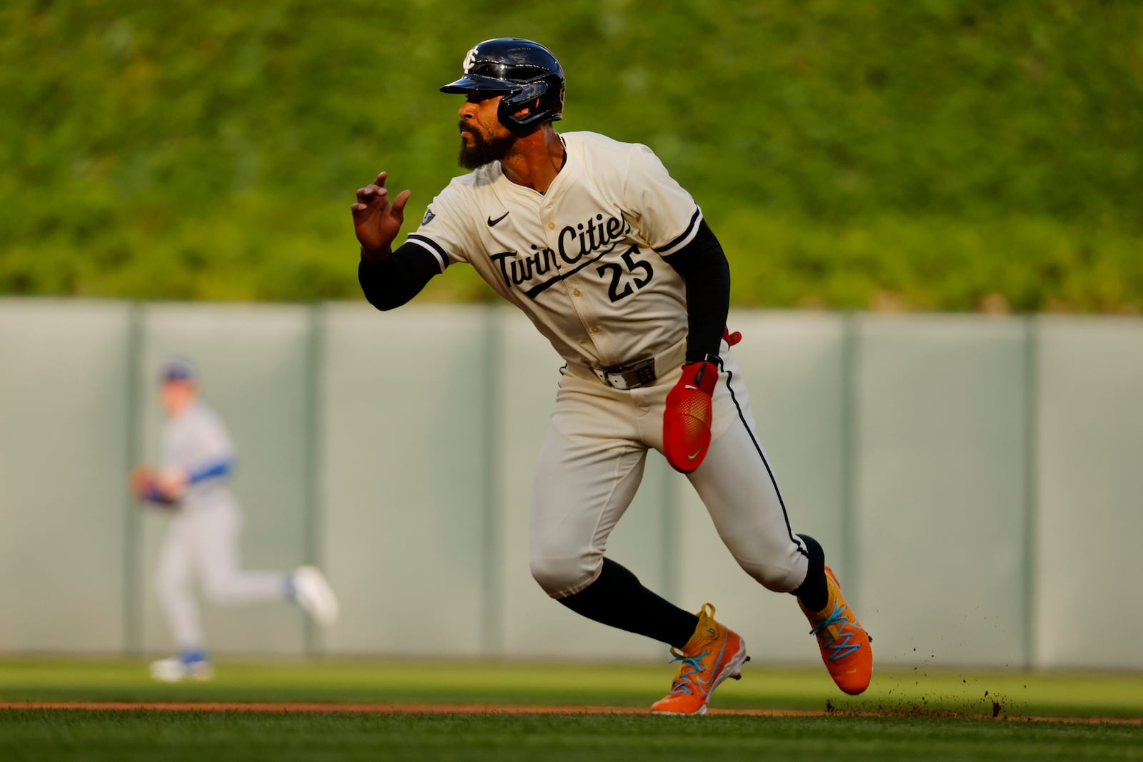 Minnesota Twins' Byron Buxton runs from second base and scores against the Chicago Cubs on a Ryan Jeffers double in the first inning of a baseball game Tuesday, July 8, 2025, in Minneapolis. (AP Photo/Bruce Kluckhohn)