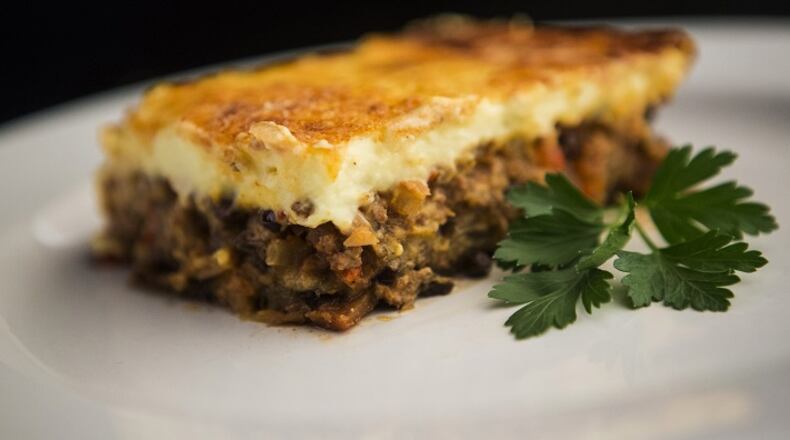 Moussaka, a layered dish of lamb, eggplants, and potatoes topped with a bechamel sauce, is photographed in the Post-Dispatch studio Wednesday, June 27, 2018. (Ryan Michalesko/St. Louis Post-Dispatch/TNS)