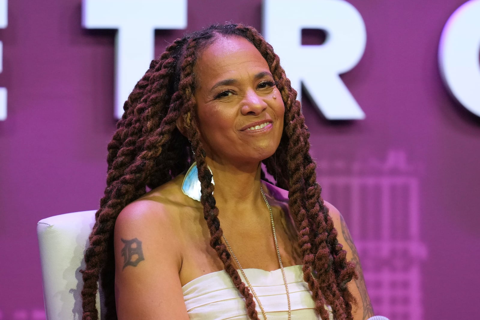 Jessica Care Moore, Detroit Poet Laureate, speaks at a Global Citizen NOW event in Detroit, Thursday, July 10, 2025. (AP Photo/Paul Sancya)