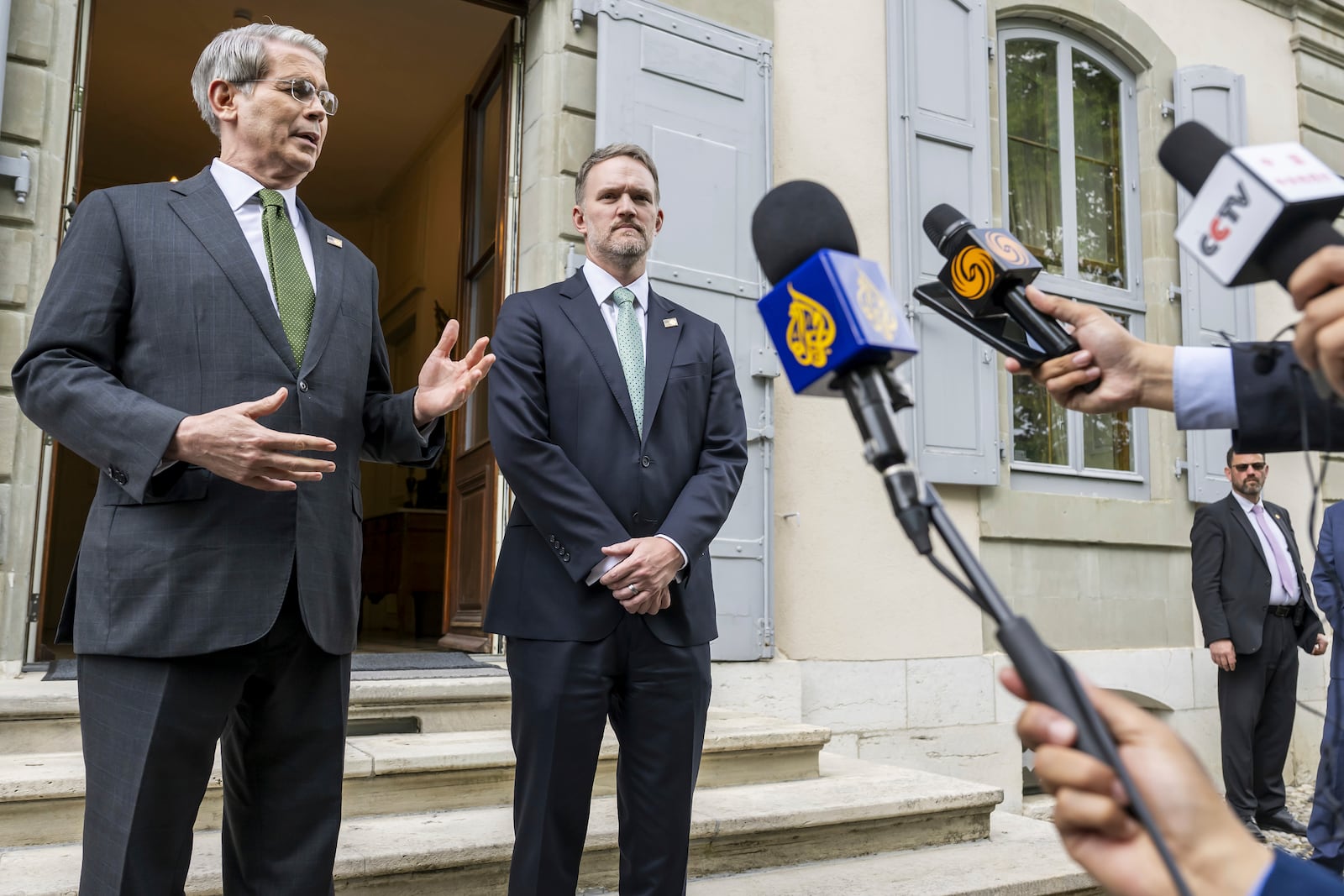 US Secretary of the Treasury Scott Bessent, left, and US Trade Representative Jamieson Greer, left, speak to the press after the second day of a bilateral meeting between the United States and China, in Geneva, Switzerland, Sunday, May 11, 2025. (Martial Trezzini/Keystone via AP)