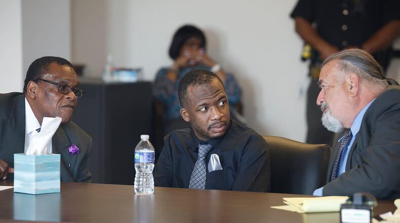 Hermanio Joseph and his interpreter listen to Joseph's atterney, Terry Hart, Wednesday, May 1, 2024 during closing arguments.  BILL LACKEY/STAFF