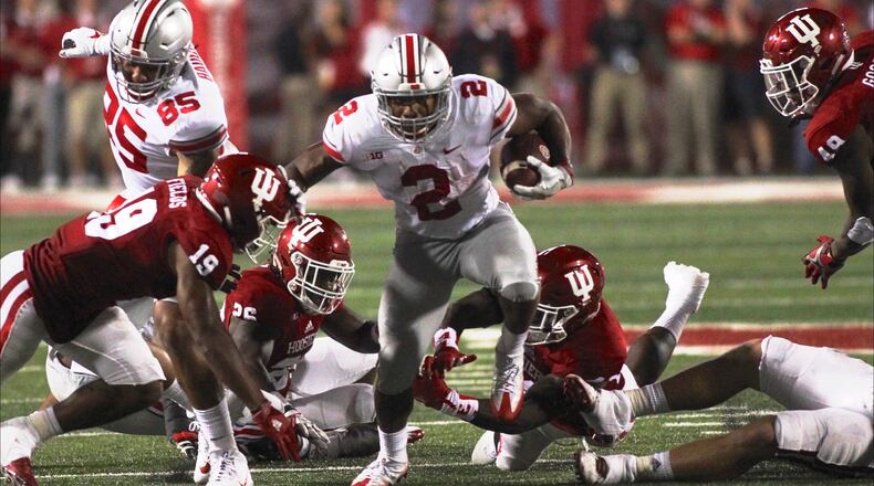 Ohio State's J.K. Dobbins runs against Indiana on Thursday, Aug. 31, 2017, at Memorial Stadium in Bloomington, Ind. David Jablonski/Staff