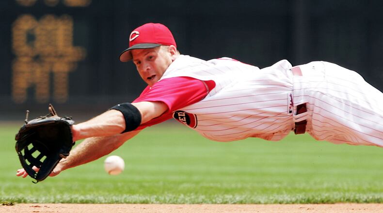 The Reds' Ryan Freel reaches for a ball during the Reds 9-5 win over the Chicago Cubs on July 21, 2005 at Great American Ballpark in Cincinnati, Ohio.  (Photo by Andy Lyons/Getty Images)