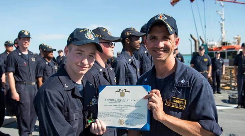 Electronics Technician 2nd Class Jacob Drake receives the Navy and Marine Corps Achievement Medal in July for his efforts during Mid-Cycle Inspection (MCI) aboard Arleigh Burke-class guided missile-class destroyer USS John S. McCain. Drake, a graduate of Triad High School, is among the sailors missing after a crash involving the USS McCain. Photo from U.S. Navy. Contributed photo