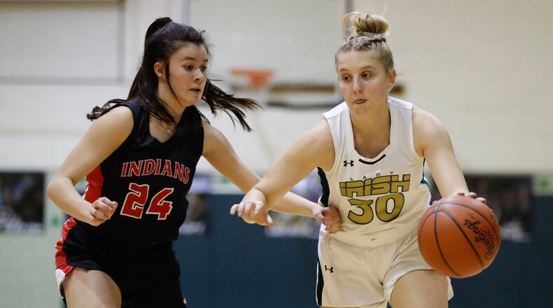 Catholic Central High School junior Serenity Castle is guarded by Cedarville sophomore Ciara Horney during a game last season at Jason Collier Gymnasium. Michael Cooper/CONTRIBUTED