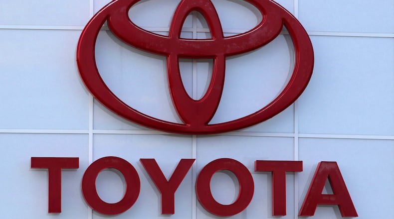 This Aug. 15, 2019 file photo shows the Toyota logo on a dealership in Manchester, N.H. (AP Photo/Charles Krupa, File)