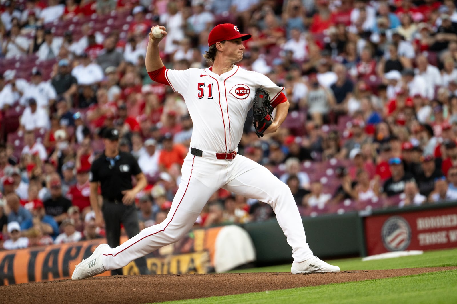 Cincinnati Reds pitcher Brady Singer throws a pitch the first inning of a baseball game against the New York Yankees, Wednesday, June 25, 2025, in Cincinnati. (AP Photo/Michael Swensen)