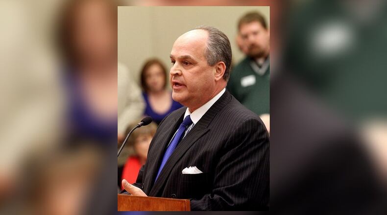 In this 2013 file photo, John Stafford speaks at a Miami Twp. public meeting. FILE