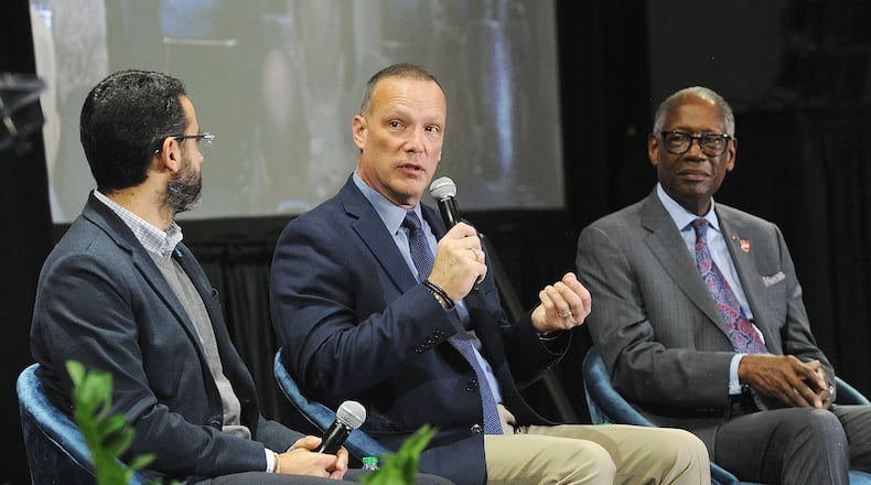 Panelists answered questions at the Dayton Development Coalition's annual meeting Wednesday, Feb. 7, 2024, Panelists were from left, Didier Papadapoulos, head of aircraft OEM for Joby Aviation, Inc., Jon Piatt, executive vice president for ISR, aviation & security at Sierra Nevada Corp. and retired U.S. Air Force Gen. Lester L. Lyles. The event was held at the National Museum of the U. S. Air Force. MARSHALL GORBY\STAFF