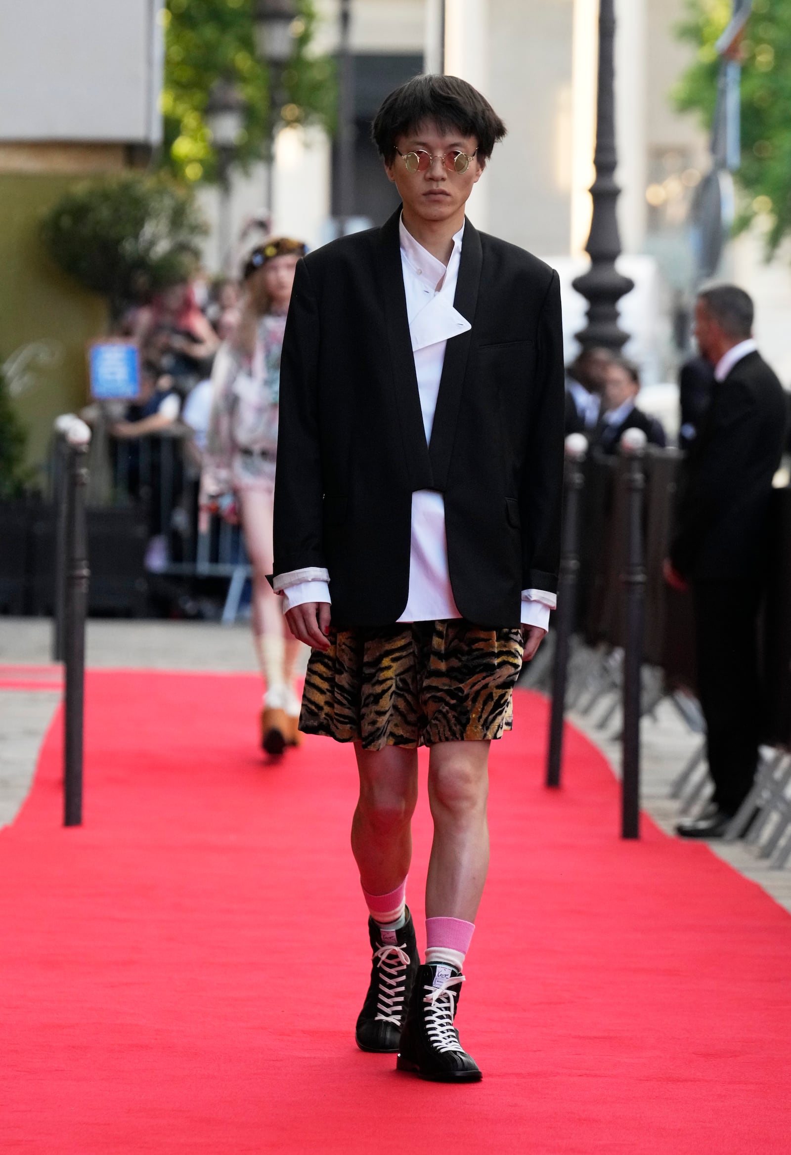 A model wears a creation as part of the men's Kenzo Spring-Summer 2026 collection, that was presented in Paris, Friday, June 27, 2025. (AP Photo/Michel Euler)