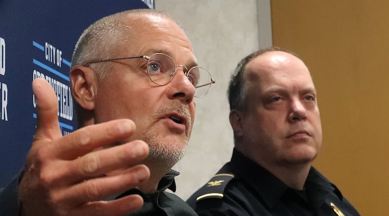 Carl Ruby, senior pastor at the Central Christian Church, and Springfield Police Chief Lee Graf, talk about the new Community Law Enforcement Advisory Team that has been formed to address racial concerns between Springfield community and law enforcement. BILL LACKEY/STAFF