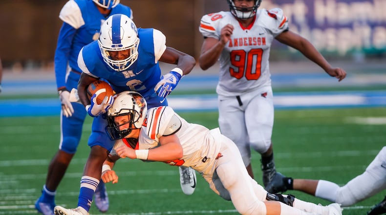 Hamilton’s Kaleb Johnson is forced out of bounds by Anderson’s Bennett Snyder during their football game Friday, Sept. 6 at Virgil M. Schwarm Stadium in Hamilton. Big Blue won 28-14. NICK GRAHAM/STAFF