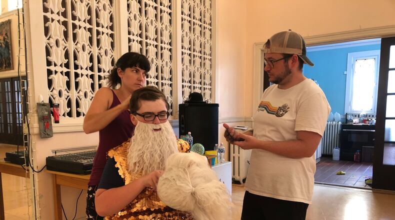 Stephanie Jenkins and Justin Hoke use a beard and wig to transform Adam Chesshir into King Triton for the Ohio Performing Arts Institute's production of "Disney's The Little Mermaid, Jr." The show, presented by the Ohio Performing Arts Institute, will be Friday and Saturday at the John Legend Theater.