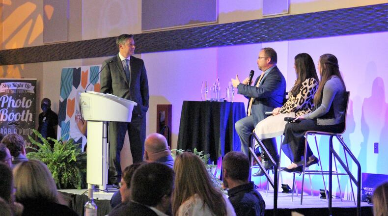 Mike McDorman, president and CEO of the Greater Springfield Partnership, is joined on stage by members of the local economic development team as they share their work with the community during an event Wednesday evening. Hasan Karim, Staff