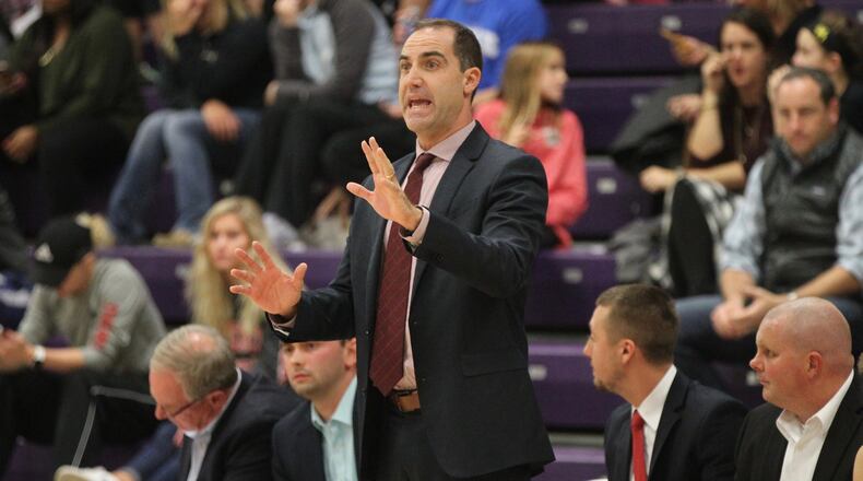 Wittenberg’s Matt Croci talks to his team during a game against Capital on Tuesday, Nov. 29, 2016, at the Capital Center in Bexley. David Jablonski/Staff