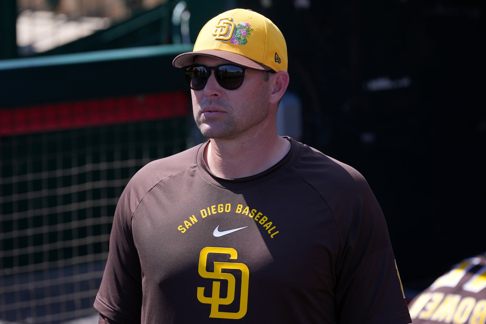 San Diego Padres manager Craig Stammen pauses in the team dugout prior to a spring training baseball game against the Los Angeles Angels Tuesday, March 10, 2026, in Tempe, Ariz. (AP Photo/Ross D. Franklin)