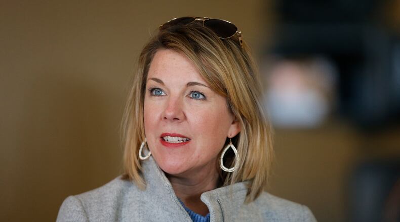 Allison Russo, Democratic candidate for 15th Congressional District, answers questions after voting Tuesday, Nov. 2, 2021, in Upper Arlington, Ohio. (AP Photo/Jay LaPrete)