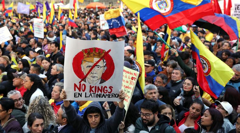 Supporters of Colombian President Gustavo Petro attend a rally he called to protest comments by U.S. President Donald Trump, in Bogota, Colombia, Wednesday, Jan. 7, 2026. (AP Photo/Santiago Saldarriaga)