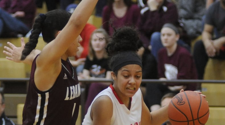 Wayne’s Olivia Trice (with ball), a starting junior guard, is the daughter of Warriors girls coach Travis Trice. MARC PENDLETON / STAFF
