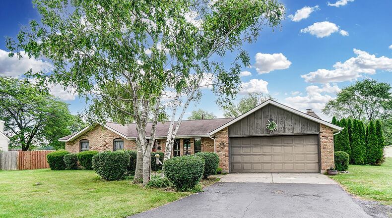 The brick ranch, which has about 1,450 sq. ft. of living space, offers 3 bedrooms and 2-car garage. The home is set on 1.14 acres. CONTRIBUTED PHOTO